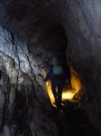 FZ025922 Jenni walking in Carreg Cennen Castle cave.jpg